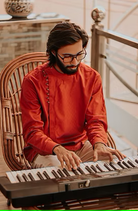 Man Playing Keyboard